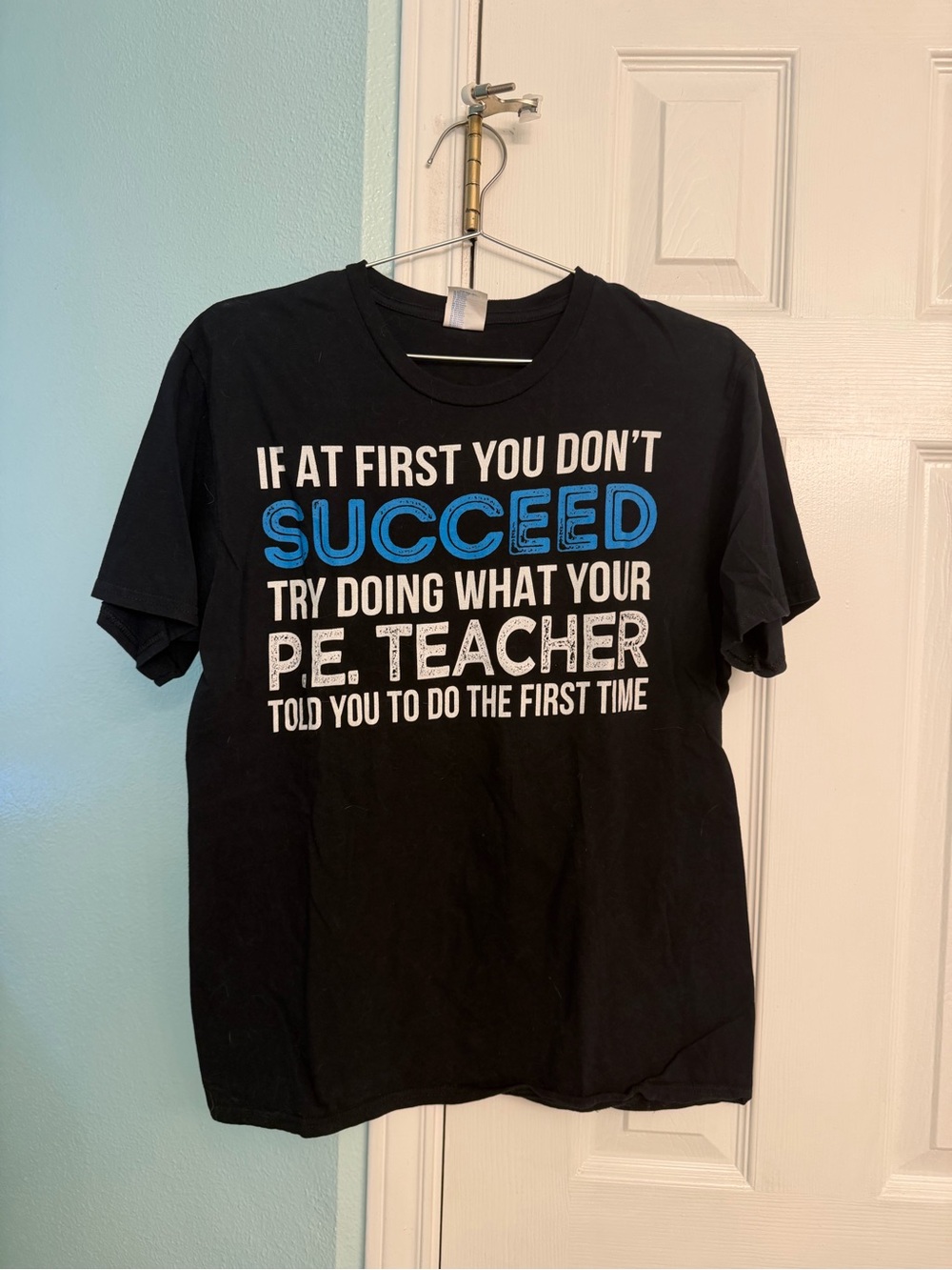 Black Graphic Tee with Blue Accent - PE Teacher Quote
